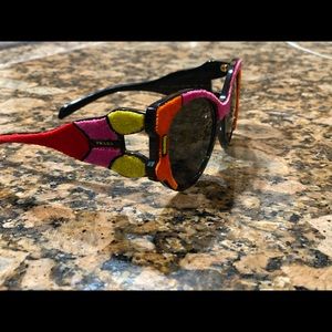 Velvet Prada sunglasses.